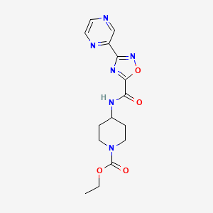 molecular formula C15H18N6O4 B2999649 Ethyl 4-(3-(pyrazin-2-yl)-1,2,4-oxadiazole-5-carboxamido)piperidine-1-carboxylate CAS No. 1219841-92-5