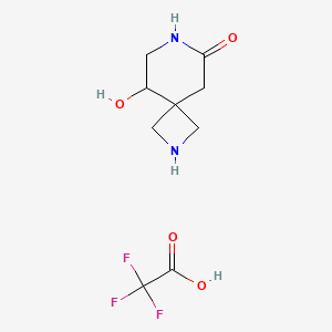 molecular formula C9H13F3N2O4 B2999955 9-羟基-2,7-二氮杂螺[3.5]壬烷-6-酮，三氟乙酸 CAS No. 2137773-84-1