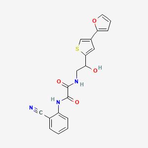 molecular formula C19H15N3O4S B3000525 N'-(2-Cyanophenyl)-N-[2-[4-(furan-2-yl)thiophen-2-yl]-2-hydroxyethyl]oxamide CAS No. 2310143-61-2