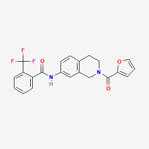 molecular formula C22H17F3N2O3 B3000799 N-(2-(furan-2-carbonyl)-1,2,3,4-tetrahydroisoquinolin-7-yl)-2-(trifluoromethyl)benzamide CAS No. 955741-75-0