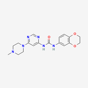 molecular formula C18H22N6O3 B3001132 1-(2,3-Dihydrobenzo[b][1,4]dioxin-6-yl)-3-(6-(4-methylpiperazin-1-yl)pyrimidin-4-yl)urea CAS No. 1396760-12-5