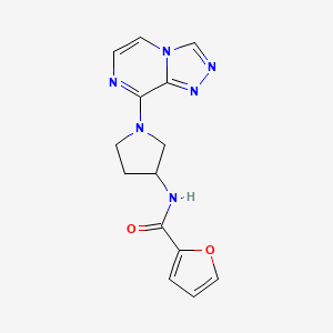 molecular formula C14H14N6O2 B3001147 N-(1-([1,2,4]triazolo[4,3-a]pyrazin-8-yl)pyrrolidin-3-yl)furan-2-carboxamide CAS No. 2034422-43-8