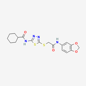 molecular formula C18H20N4O4S2 B3001276 N-(5-((2-(benzo[d][1,3]dioxol-5-ylamino)-2-oxoethyl)thio)-1,3,4-thiadiazol-2-yl)cyclohexanecarboxamide CAS No. 868972-86-5