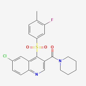 molecular formula C22H20ClFN2O3S B3002007 6-Chloro-4-[(3-fluoro-4-methylphenyl)sulfonyl]-3-(piperidin-1-ylcarbonyl)quinoline CAS No. 1111014-14-2