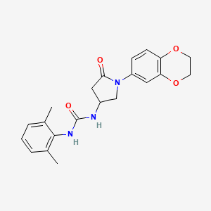 molecular formula C21H23N3O4 B3002048 1-(1-(2,3-Dihydrobenzo[b][1,4]dioxin-6-yl)-5-oxopyrrolidin-3-yl)-3-(2,6-dimethylphenyl)urea CAS No. 891114-04-8