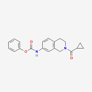 molecular formula C20H20N2O3 B3002132 Phenyl (2-(cyclopropanecarbonyl)-1,2,3,4-tetrahydroisoquinolin-7-yl)carbamate CAS No. 955711-96-3