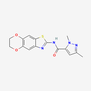 molecular formula C15H14N4O3S B3003108 N-(6,7-dihydro-[1,4]dioxino[2',3':4,5]benzo[1,2-d]thiazol-2-yl)-1,3-dimethyl-1H-pyrazole-5-carboxamide CAS No. 1013796-73-0