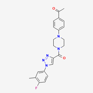 molecular formula C22H22FN5O2 B3003786 1-[4-(4-{[1-(4-fluoro-3-methylphenyl)-1H-1,2,3-triazol-4-yl]carbonyl}piperazin-1-yl)phenyl]ethanone CAS No. 1326897-50-0