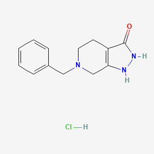 molecular formula C13H16ClN3O B3004681 6-Benzyl-1,2,4,5,6,7-hexahydro-3H-pyrazolo[3,4-c]pyridin-3-one hydrochloride CAS No. 1782461-34-0