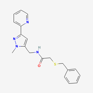 2-Benzylsulfanyl-N-[(2-methyl-5-pyridin-2-ylpyrazol-3-yl)methyl]acetamide
