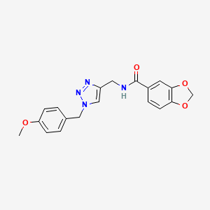 molecular formula C19H18N4O4 B3004816 N-[[1-[(4-Methoxyphenyl)methyl]triazol-4-yl]methyl]-1,3-benzodioxole-5-carboxamide CAS No. 2379972-86-6