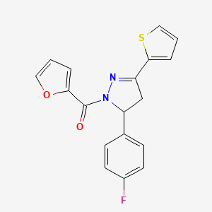 molecular formula C18H13FN2O2S B3006058 5-(4-fluorophenyl)-1-(2-furoyl)-3-(2-thienyl)-4,5-dihydro-1H-pyrazole CAS No. 438482-49-6