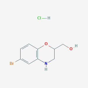 B3006647 (6-bromo-3,4-dihydro-2H-1,4-benzoxazin-2-yl)methanol hydrochloride CAS No. 2219380-18-2