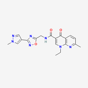1-ethyl-7-methyl-N-((3-(1-methyl-1H-pyrazol-4-yl)-1,2,4-oxadiazol-5-yl)methyl)-4-oxo-1,4-dihydro-1,8-naphthyridine-3-carboxamide