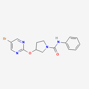 molecular formula C15H15BrN4O2 B3007040 3-[(5-bromopyrimidin-2-yl)oxy]-N-phenylpyrrolidine-1-carboxamide CAS No. 2097932-17-5