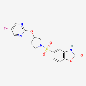 molecular formula C15H13FN4O5S B3007277 5-((3-((5-fluoropyrimidin-2-yl)oxy)pyrrolidin-1-yl)sulfonyl)benzo[d]oxazol-2(3H)-one CAS No. 2034360-75-1