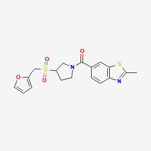 molecular formula C18H18N2O4S2 B3007438 (3-((Furan-2-ylmethyl)sulfonyl)pyrrolidin-1-yl)(2-methylbenzo[d]thiazol-6-yl)methanone CAS No. 1788771-54-9
