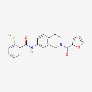 molecular formula C22H20N2O3S B3007607 N-(2-(呋喃-2-羰基)-1,2,3,4-四氢异喹啉-7-基)-2-(甲硫基)苯甲酰胺 CAS No. 1207038-98-9