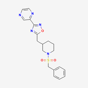 molecular formula C19H21N5O3S B3008312 5-((1-(Benzylsulfonyl)piperidin-3-yl)methyl)-3-(pyrazin-2-yl)-1,2,4-oxadiazole CAS No. 1706015-90-8