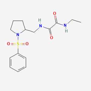 molecular formula C15H21N3O4S B3008391 N1-ethyl-N2-((1-(phenylsulfonyl)pyrrolidin-2-yl)methyl)oxalamide CAS No. 896269-54-8