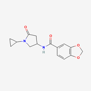 molecular formula C15H16N2O4 B3008673 N-(1-cyclopropyl-5-oxopyrrolidin-3-yl)benzo[d][1,3]dioxole-5-carboxamide CAS No. 1351621-07-2