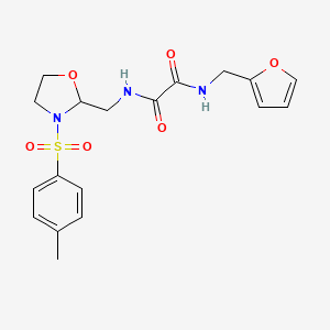 molecular formula C18H21N3O6S B3009481 N1-(呋喃-2-基甲基)-N2-((3-甲苯磺酰氧唑烷-2-基)甲基)草酰胺 CAS No. 874806-07-2