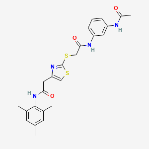 molecular formula C24H26N4O3S2 B3009980 N-(3-acetamidophenyl)-2-((4-(2-(mesitylamino)-2-oxoethyl)thiazol-2-yl)thio)acetamide CAS No. 953984-83-3