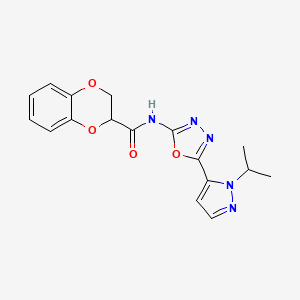 molecular formula C17H17N5O4 B3010557 N-(5-(1-isopropyl-1H-pyrazol-5-yl)-1,3,4-oxadiazol-2-yl)-2,3-dihydrobenzo[b][1,4]dioxine-2-carboxamide CAS No. 1170398-08-9