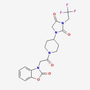 molecular formula C19H19F3N4O5 B3012590 1-{1-[2-(2-Oxo-2,3-dihydro-1,3-benzoxazol-3-yl)acetyl]piperidin-4-yl}-3-(2,2,2-trifluoroethyl)imidazolidine-2,4-dione CAS No. 2097894-43-2