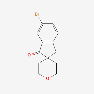 molecular formula C13H13BrO2 B3013101 6-溴-2',3',5',6'-四氢螺[茚满-2,4'-吡喃]-1(3H)-酮 CAS No. 1245514-78-6