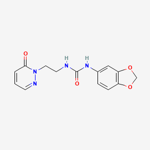 molecular formula C14H14N4O4 B3013228 1-(苯并[d][1,3]二氧杂环-5-基)-3-(2-(6-氧代哒嗪-1(6H)-基)乙基)脲 CAS No. 1105222-10-3