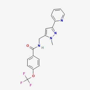 molecular formula C18H15F3N4O2 B3013300 N-[(2-Methyl-5-pyridin-2-ylpyrazol-3-yl)methyl]-4-(trifluoromethoxy)benzamide CAS No. 2320825-86-1