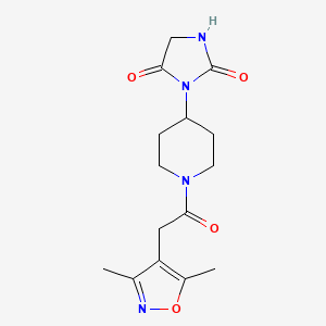 molecular formula C15H20N4O4 B3014100 3-(1-(2-(3,5-二甲基异恶唑-4-基)乙酰)哌啶-4-基)咪唑烷-2,4-二酮 CAS No. 2320506-63-4