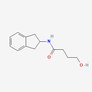 B3014946 N-(2,3-dihydro-1H-inden-2-yl)-4-hydroxybutanamide CAS No. 688310-13-6