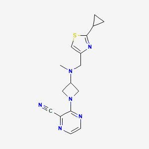 molecular formula C16H18N6S B3015075 3-[3-[(2-Cyclopropyl-1,3-thiazol-4-yl)methyl-methylamino]azetidin-1-yl]pyrazine-2-carbonitrile CAS No. 2380175-24-4