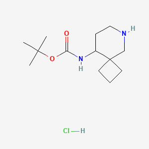 molecular formula C13H25ClN2O2 B3015347 叔丁基 N-(6-氮杂螺[3.5]壬-9-基)氨基甲酸酯；盐酸盐 CAS No. 2247107-77-1