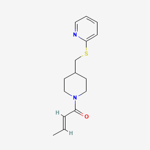 molecular formula C15H20N2OS B3015526 (E)-1-(4-((pyridin-2-ylthio)methyl)piperidin-1-yl)but-2-en-1-one CAS No. 1421586-46-0