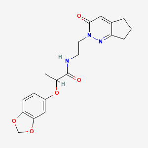 molecular formula C19H21N3O5 B3016048 2-(benzo[d][1,3]dioxol-5-yloxy)-N-(2-(3-oxo-3,5,6,7-tetrahydro-2H-cyclopenta[c]pyridazin-2-yl)ethyl)propanamide CAS No. 2034388-98-0