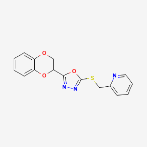 2-(2,3-Dihydrobenzo[b][1,4]dioxin-2-yl)-5-((pyridin-2-ylmethyl)thio)-1,3,4-oxadiazole