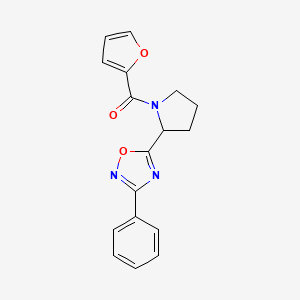 molecular formula C17H15N3O3 B3017837 5-[1-(2-Furoyl)pyrrolidin-2-yl]-3-phenyl-1,2,4-oxadiazole CAS No. 1046242-14-1