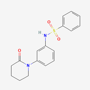 molecular formula C17H18N2O3S B3018464 N-[3-(2-oxopiperidin-1-yl)phenyl]benzenesulfonamide CAS No. 941893-47-6