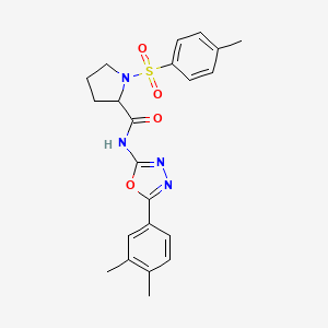 molecular formula C22H24N4O4S B3018870 N-(5-(3,4-dimethylphenyl)-1,3,4-oxadiazol-2-yl)-1-tosylpyrrolidine-2-carboxamide CAS No. 1049942-02-0