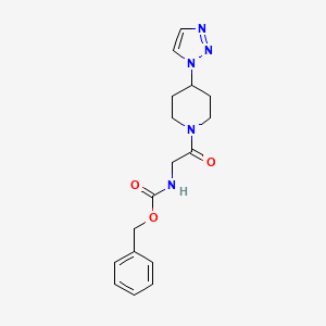 benzyl (2-(4-(1H-1,2,3-triazol-1-yl)piperidin-1-yl)-2-oxoethyl)carbamate