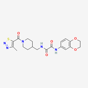 molecular formula C20H23N5O5S B3019917 N1-(2,3-dihydrobenzo[b][1,4]dioxin-6-yl)-N2-((1-(4-methyl-1,2,3-thiadiazole-5-carbonyl)piperidin-4-yl)methyl)oxalamide CAS No. 1235088-85-3