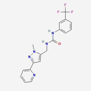 molecular formula C18H16F3N5O B3020034 1-[(2-Methyl-5-pyridin-2-ylpyrazol-3-yl)methyl]-3-[3-(trifluoromethyl)phenyl]urea CAS No. 2319639-81-9