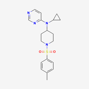 N-Cyclopropyl-N-[1-(4-methylphenyl)sulfonylpiperidin-4-yl]pyrimidin-4-amine