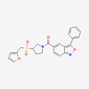 molecular formula C23H20N2O5S B3020230 (3-((Furan-2-ylmethyl)sulfonyl)pyrrolidin-1-yl)(3-phenylbenzo[c]isoxazol-5-yl)methanone CAS No. 1795409-05-0