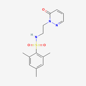 molecular formula C15H19N3O3S B3020796 2,4,6-trimethyl-N-(2-(6-oxopyridazin-1(6H)-yl)ethyl)benzenesulfonamide CAS No. 1040657-12-2
