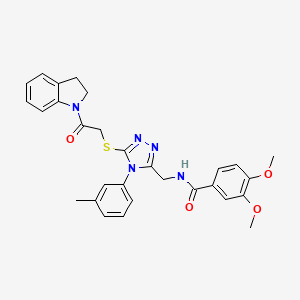 N-((5-((2-(indolin-1-yl)-2-oxoethyl)thio)-4-(m-tolyl)-4H-1,2,4-triazol-3-yl)methyl)-3,4-dimethoxybenzamide