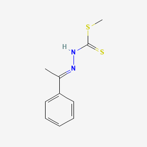 B3022548 {[(Methylsulfanyl)methanethioyl]amino}(1-phenylethylidene)amine CAS No. 26155-38-4